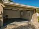 The spacious open two car garage features ample room for vehicles and storage, plus bright light at 5005 Puritan Rd, Tampa, FL 33617