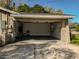 Wide shot of the two car garage showcasing the door opening, spacious interior, and storage space at 5005 Puritan Rd, Tampa, FL 33617