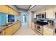 Well-equipped kitchen flowing into other living spaces, great for entertaining at 5005 Puritan Rd, Tampa, FL 33617