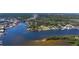 Gorgeous aerial view of waterfront properties, docks, and vibrant coastline at 5425 Bluepoint Dr, Port Richey, FL 34668
