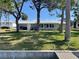 Home with a spacious, well-maintained backyard, ideal for outdoor activities and enjoying the surrounding nature at 5425 Bluepoint Dr, Port Richey, FL 34668