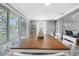 Spacious dining area with bench seating, large windows, and stylish decor at 5425 Bluepoint Dr, Port Richey, FL 34668
