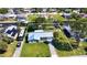 Charming single-story home with lush lawn and mature trees on an oversized lot at 5425 Bluepoint Dr, Port Richey, FL 34668