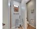 The bathroom is a cozy space, with a starfish wall decoration, towel rack, and light blue paint at 5728 Sunset Falls Dr, Apollo Beach, FL 33572