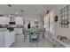 Dining area with shuttered windows adjacent to kitchen at 5728 Sunset Falls Dr, Apollo Beach, FL 33572