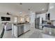 Spacious kitchen with stainless steel appliances opens to the living area at 5728 Sunset Falls Dr, Apollo Beach, FL 33572