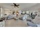 Open living space with comfortable seating and seamless access to the kitchen and dining areas at 5728 Sunset Falls Dr, Apollo Beach, FL 33572