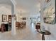 Open concept living area with tile flooring throughout the home and dining area at 5728 Sunset Falls Dr, Apollo Beach, FL 33572
