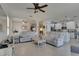 Open living space with comfortable seating, seamless access to the kitchen, and plenty of natural light at 5728 Sunset Falls Dr, Apollo Beach, FL 33572
