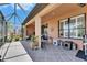 A spacious screened lanai is enhanced with plants and natural light at 5728 Sunset Falls Dr, Apollo Beach, FL 33572