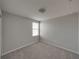 Bedroom featuring neutral walls and carpet and a bright window at 6222 Trent Creek Dr, Sun City Center, FL 33573