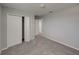 Light-filled bedroom with a closet and soft gray walls and carpet at 6222 Trent Creek Dr, Sun City Center, FL 33573