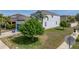 A charming two-story home with lush lawn and mature trees in a desirable neighborhood at 6222 Trent Creek Dr, Sun City Center, FL 33573
