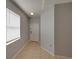 Welcoming foyer featuring neutral paint, tile floors, and a window for natural light at 6222 Trent Creek Dr, Sun City Center, FL 33573