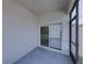 A screened-in lanai showcasing a door to the backyard at 6222 Trent Creek Dr, Sun City Center, FL 33573