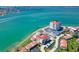 An aerial view showing beautiful waterfront condos with stunning turquoise water views at 6279 Sun Blvd # 103, St Petersburg, FL 33715