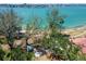 Scenic aerial view of the waterfront with visible landscaping and outdoor recreational area at 6279 Sun Blvd # 103, St Petersburg, FL 33715