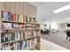 Community library area with a vast collection of books and comfortable seating at 6279 Sun Blvd # 103, St Petersburg, FL 33715