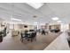 Well-lit community room with multiple seating areas and a billiards table for recreation at 6279 Sun Blvd # 103, St Petersburg, FL 33715