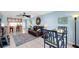 Open-concept living area with tile flooring, comfortable seating, and a dining table near the kitchen at 6279 Sun Blvd # 103, St Petersburg, FL 33715
