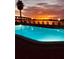 Sunset views over the pool offer a relaxing scene, complete with comfortable lounge chairs at 6279 Sun Blvd # 103, St Petersburg, FL 33715