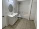 This bathroom features a single sink vanity, toilet, and shower-tub combo at 6411 26Th W St, Bradenton, FL 34207