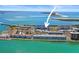 Aerial view showcases the real estate's location on the water with nearby amenities at 7 Elgin Pl # 510, Dunedin, FL 34698