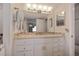 Bathroom vanity with a decorative tile backsplash at 7 Elgin Pl # 510, Dunedin, FL 34698
