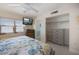 Bedroom with closet and coastal view from the window at 7 Elgin Pl # 510, Dunedin, FL 34698