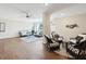 Bright and airy community living room featuring ample seating, hardwood floors, and neutral decor at 736 Island Way # 1101, Clearwater Beach, FL 33767