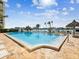 Sparkling pool area with waterfront views and lush landscaping at 736 Island Way # 1101, Clearwater Beach, FL 33767