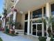 Elegant condo building entrance with a clear view of the front doors and surrounding greenery at 750 4Th S Ave # 403C, St Petersburg, FL 33701