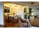 Open concept dining area featuring stylish artwork, decor, and a wine refrigerator at 750 4Th S Ave # 403C, St Petersburg, FL 33701