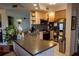 Bright kitchen featuring stainless steel appliances, tile backsplash, and ample counter space for cooking at 750 4Th S Ave # 403C, St Petersburg, FL 33701