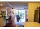 Spacious living room offering a view of the balcony creating a bright atmosphere with hardwood floors at 750 4Th S Ave # 403C, St Petersburg, FL 33701