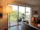 Cozy living room offering a view of the balcony showcasing city views and a bright atmosphere at 750 4Th S Ave # 403C, St Petersburg, FL 33701