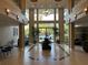 Bright, opulent lobby area with tile flooring, ornate furnishings, and a grand chandelier at 750 4Th S Ave # 403C, St Petersburg, FL 33701