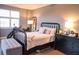 Bedroom features comfortable furnishings and natural light at 750 4Th S Ave # 403C, St Petersburg, FL 33701