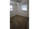 Bedroom featuring laminate flooring, ample natural light, and a ceiling fan at 7932 Palatine Dr, Hudson, FL 34667