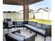 Cozy covered patio with comfortable seating, perfect for outdoor relaxation and entertaining at 811 College Leaf Way, Ruskin, FL 33570