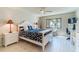 Beautiful bedroom with a king bed, nautical decor, and a bright window with water views at 825 S Gulfview Blvd # 202, Clearwater Beach, FL 33767