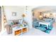 Cozy living room decorated with nautical decor and wood-look flooring, leading to a relaxing vibe at 825 S Gulfview Blvd # 202, Clearwater Beach, FL 33767