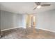 Bedroom featuring wood-look tile flooring, ceiling fan, and light blue walls at 8302 W Pocahontas Ave, Tampa, FL 33615