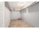 Walk-in closet with shelving to maximize storage, and tile flooring at 8302 W Pocahontas Ave, Tampa, FL 33615