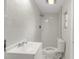 Bright bathroom featuring tiled walls and modern fixtures at 9135 Suffolk Ln, Port Richey, FL 34668