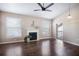 Inviting living room showcasing the wood floors, fireplace, and natural light at 10434 Villa View Cir, Tampa, FL 33647