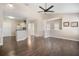 The open floor plan seamlessly integrates the living area and a breakfast bar at 10434 Villa View Cir, Tampa, FL 33647