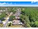 Aerial view of neighborhood featuring tree lined streets and mature landscaping at 10509 Deepbrook Dr, Riverview, FL 33569