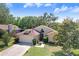 Well maintained one-story home with attached two-car garage, landscaped front yard and flagpole at 10509 Deepbrook Dr, Riverview, FL 33569