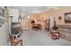 Spacious living room and dining room combo with neutral carpet and lots of natural light at 10509 Deepbrook Dr, Riverview, FL 33569